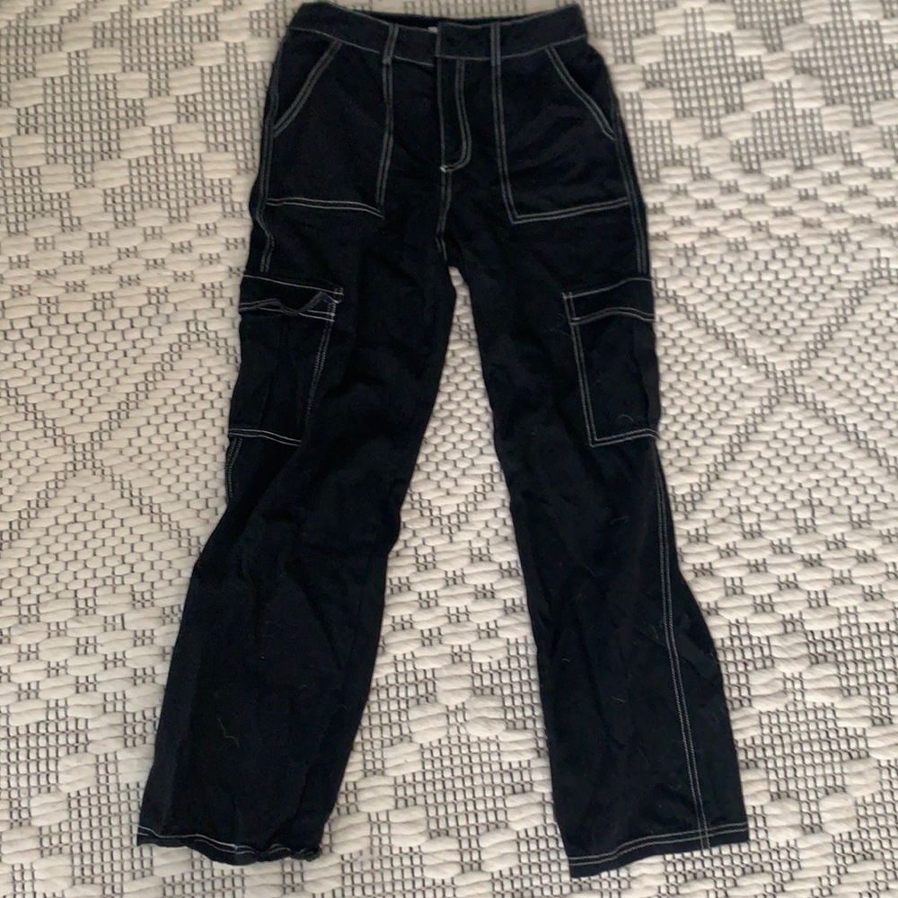 Black pants with white stitching